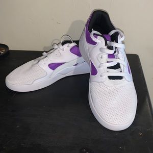 Pumas shoes. Size 9 in woman’s. Purple and white with rubber bottom.